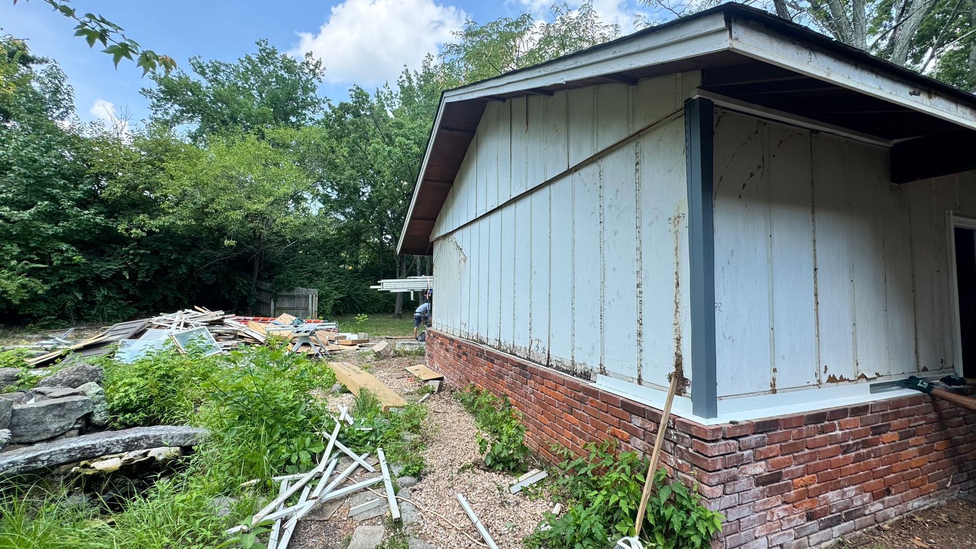 Sold sign in front of home, symbolizing a sell house fast in a residential area.