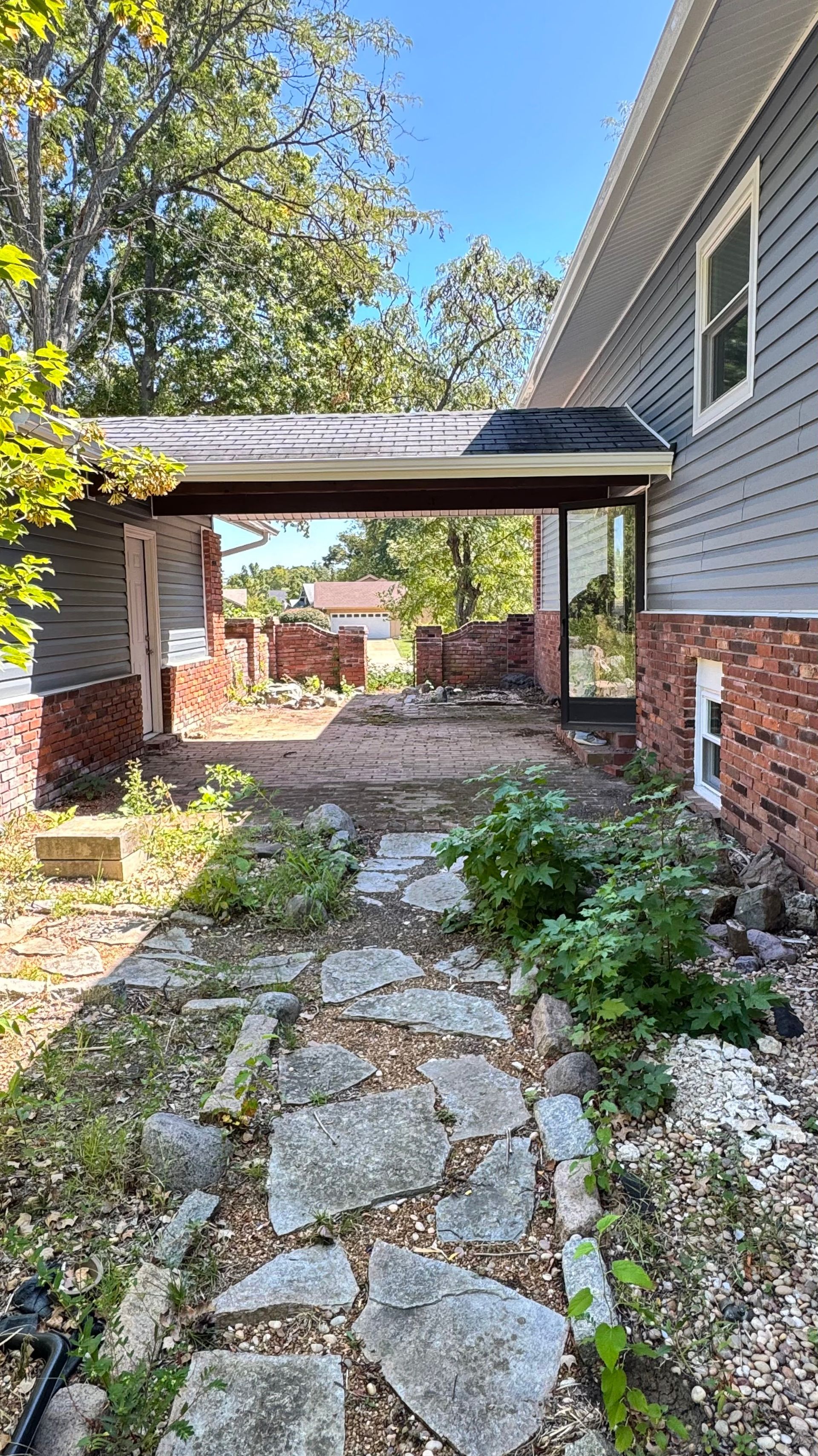 Sold sign in front of home, symbolizing a sell house fast in a residential area.