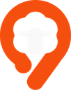 An orange circle with a white sheep inside of it