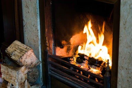 Wood burning fireplace - Chimney Cleaning & Repair service in Cumberland, RI