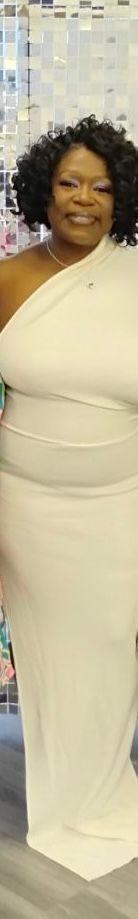 A blurry picture of a person holding a piece of paper.