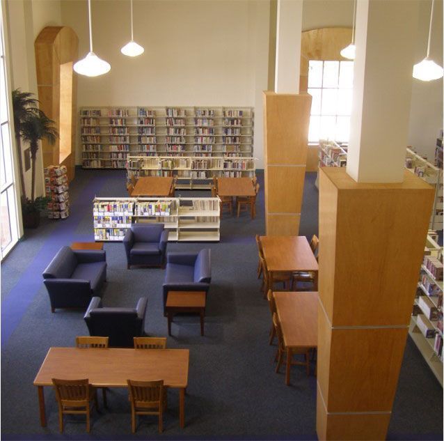 An aerial view of a library with tables and chairs