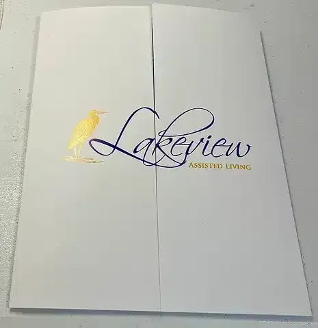 A white folder with the word lakeview on it.