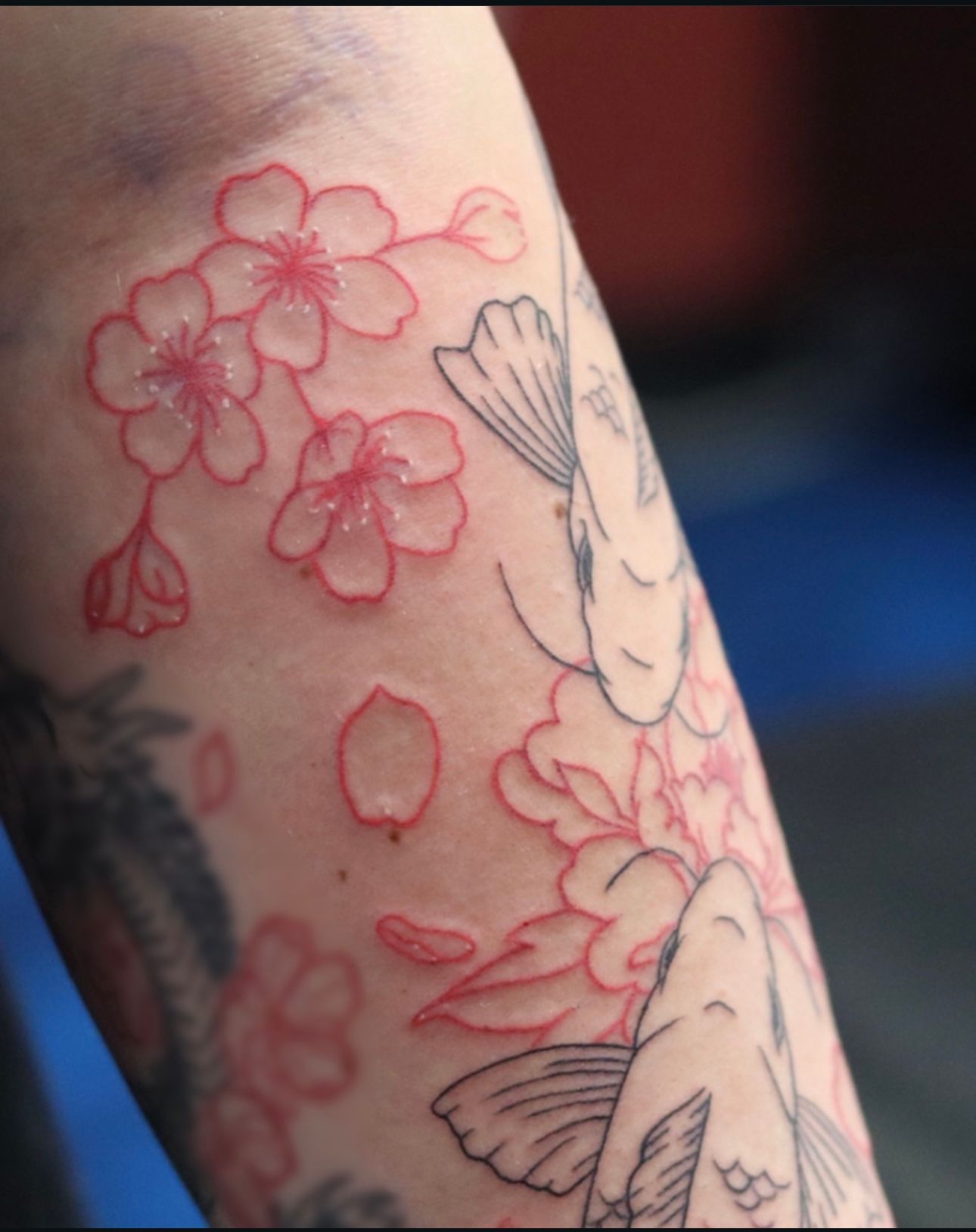 A close up of a tattoo on a person 's arm