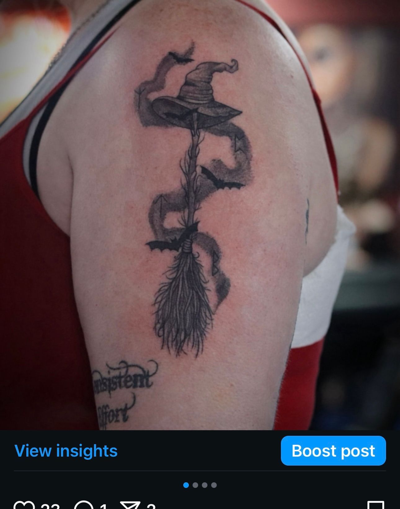 A woman has a tattoo of a witch hat on her arm