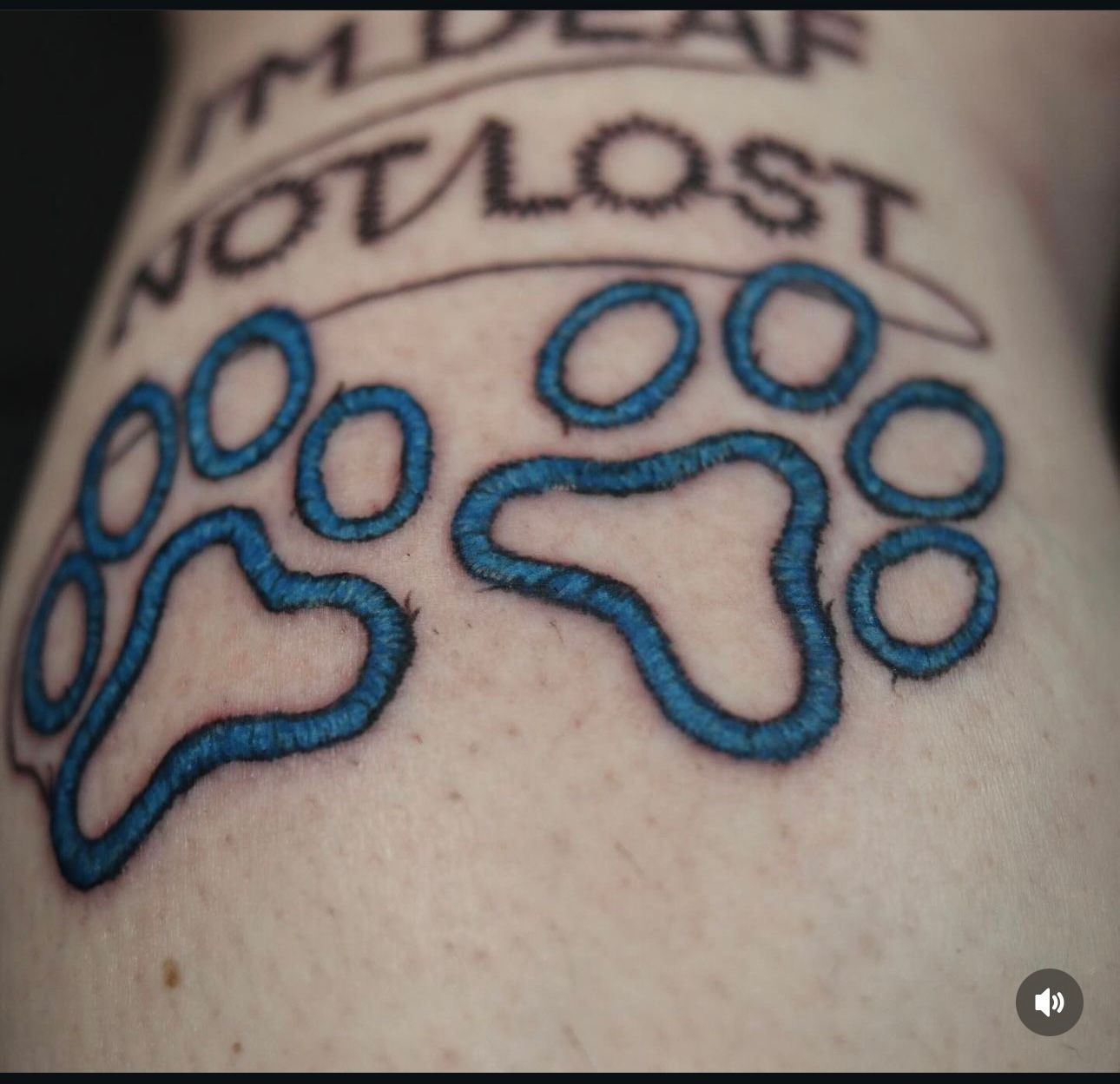 A close up of a tattoo that says i 'm deaf not lost