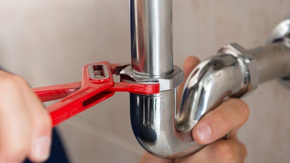 Plumber Repair Leaky Faucet — Plumbing in Canberra, ACT