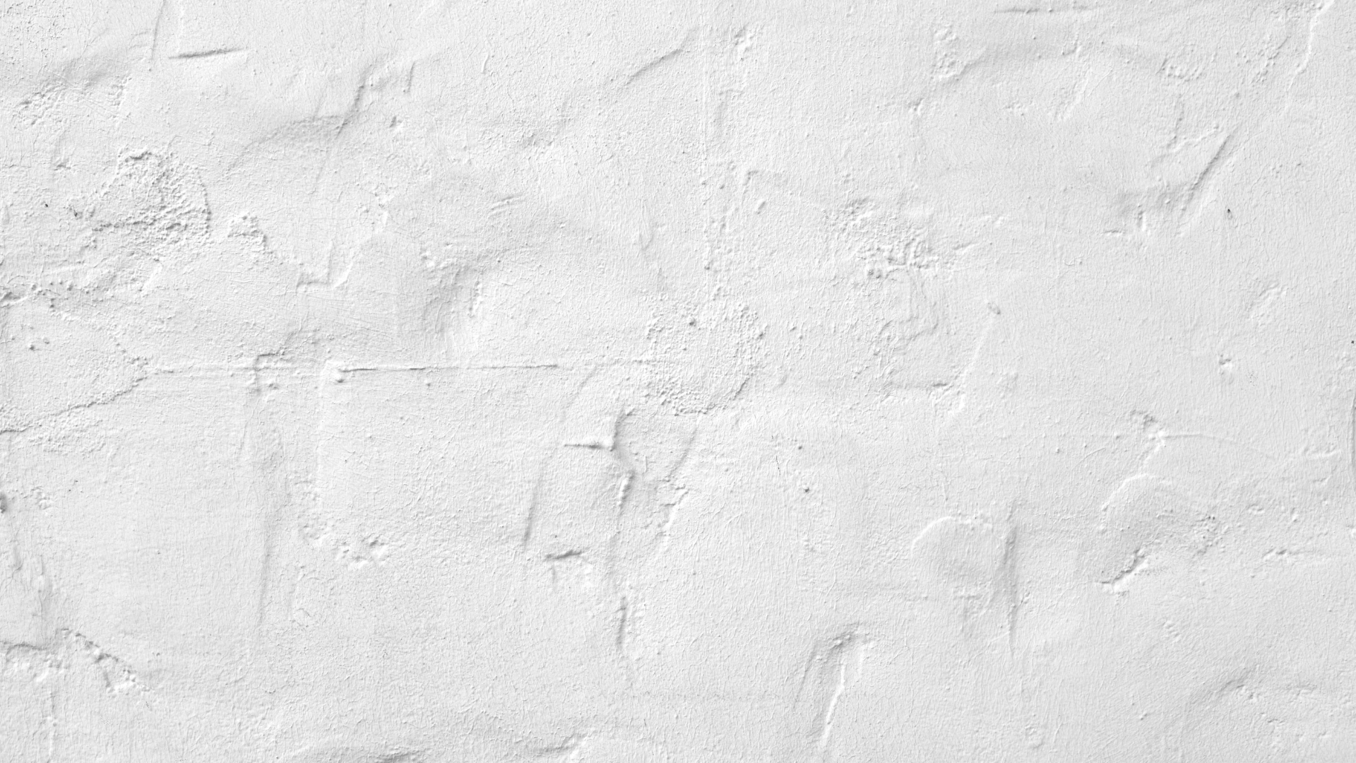 A close up of a white brick wall.