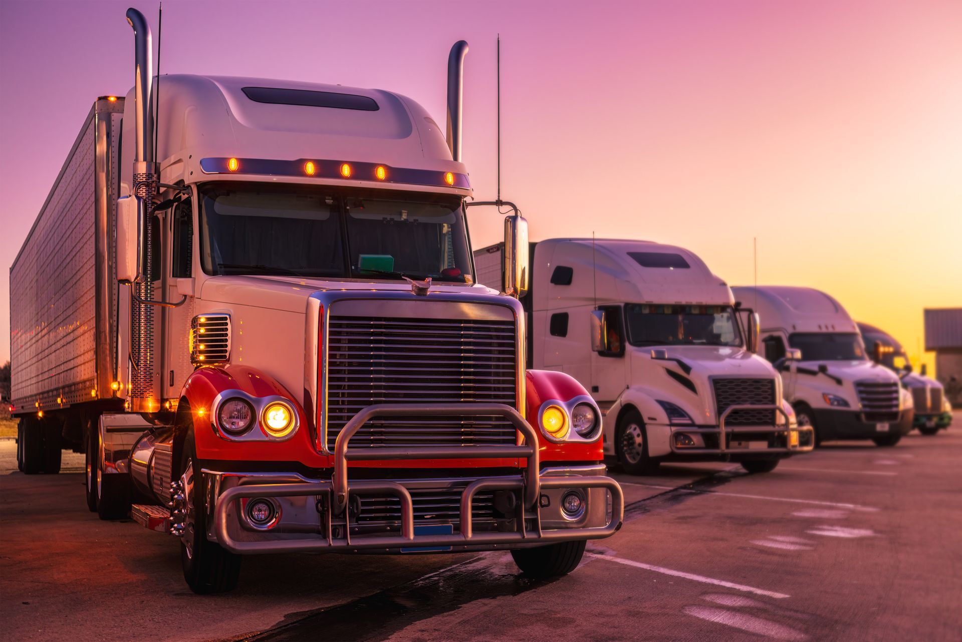 Heavy duty trucks parked awaiting professional heavy duty truck repair service. Heavy duty trucks parked awaiting professional heavy duty truck repair service.