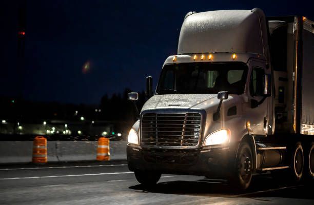 Truck on the road at night 