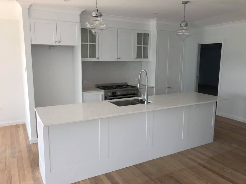 Kitchen Cabinets and Center Island — Cabinet Makers in Kew, NSW