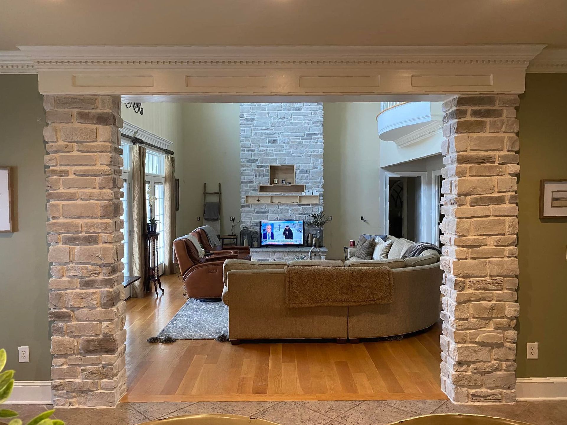 An elegant stylish brick wall designed inside the living area.