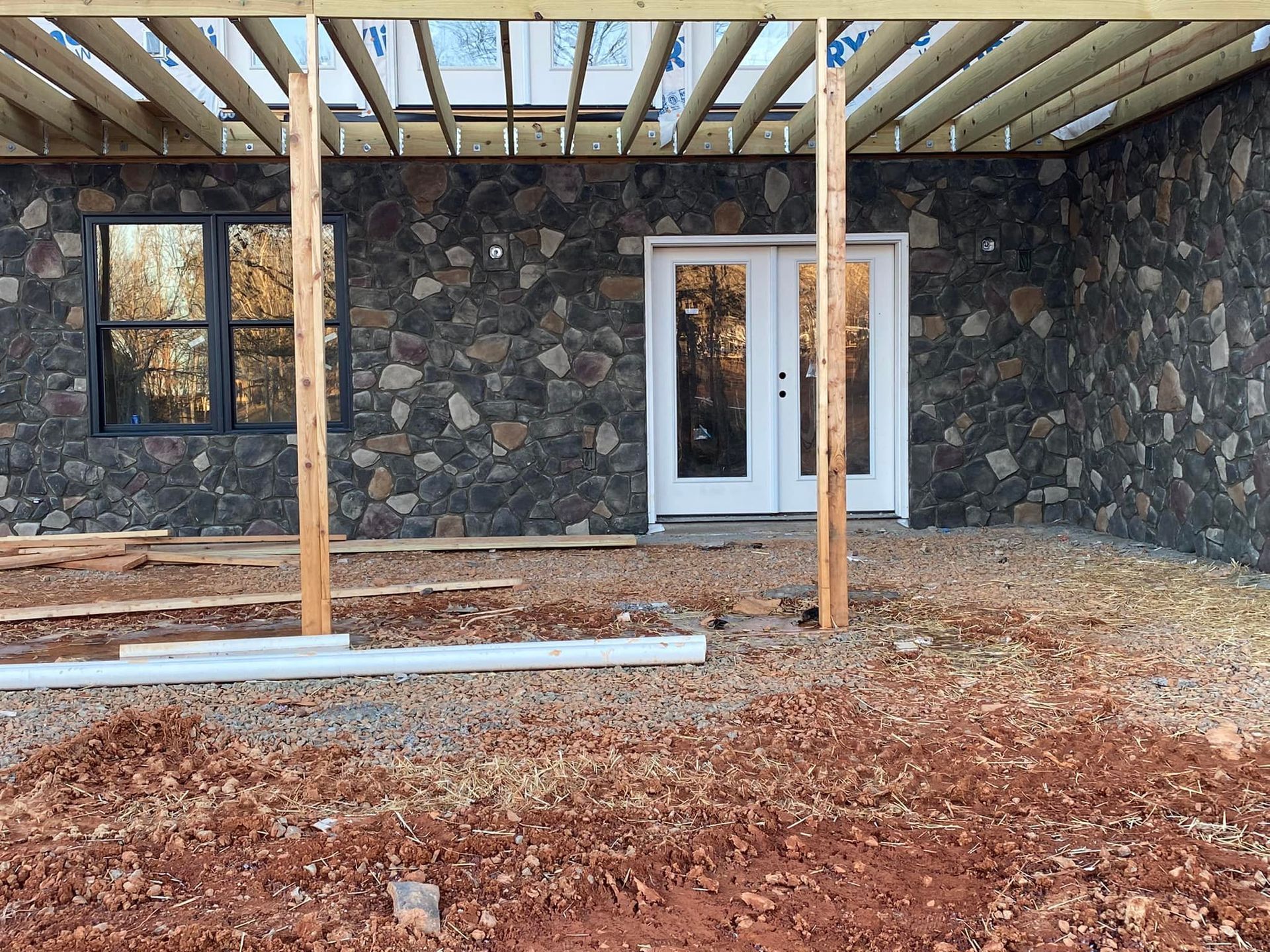 Stone with wood ceiling undersconstruction