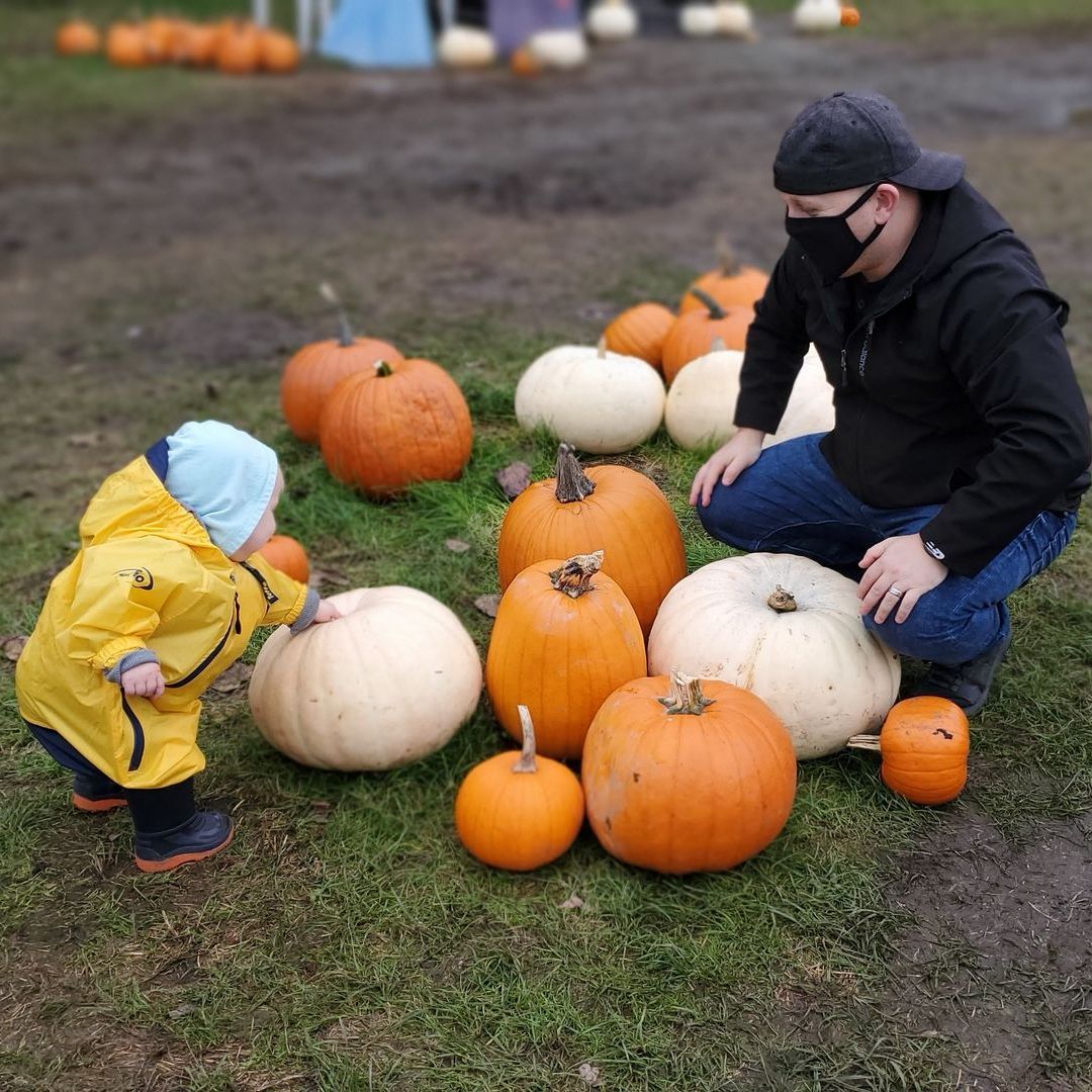 Jesse with pumpkins