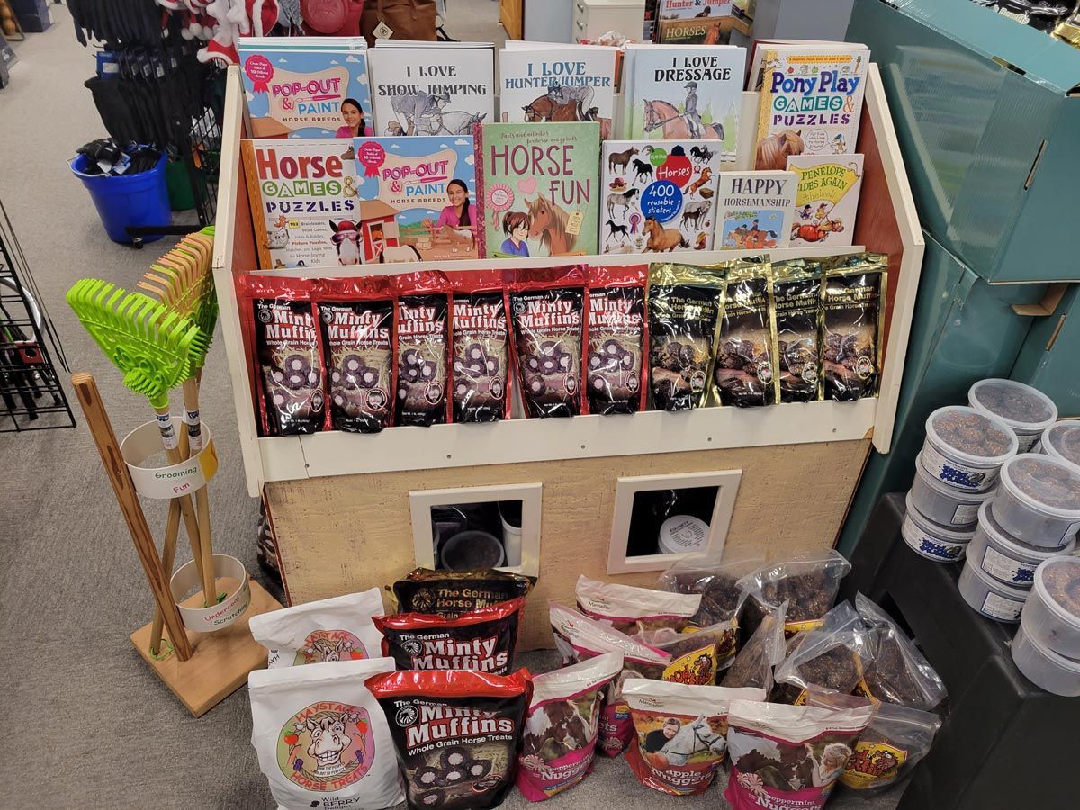 Horse Treats And Books On Shelf — Woodinville, WA — The Gift Horse Saddlery