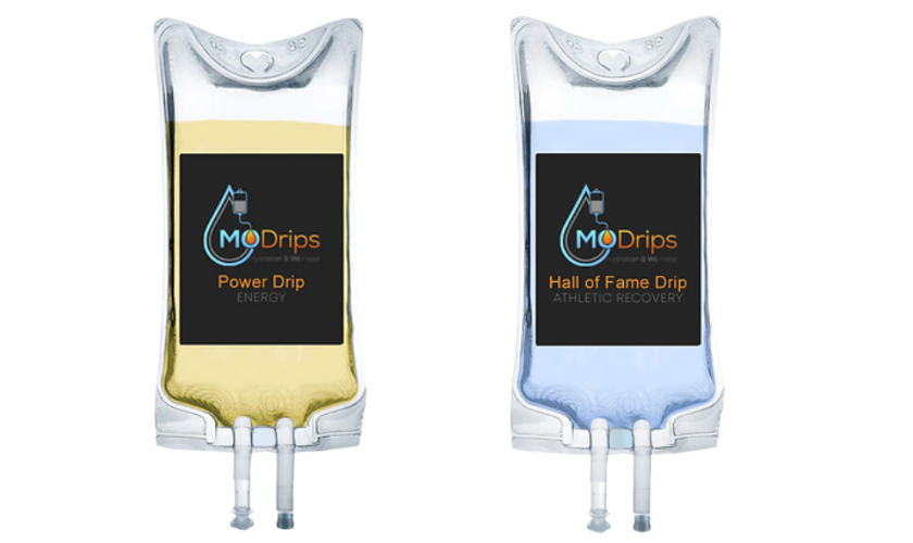 Two bags of liquid are sitting next to each other on a white background.