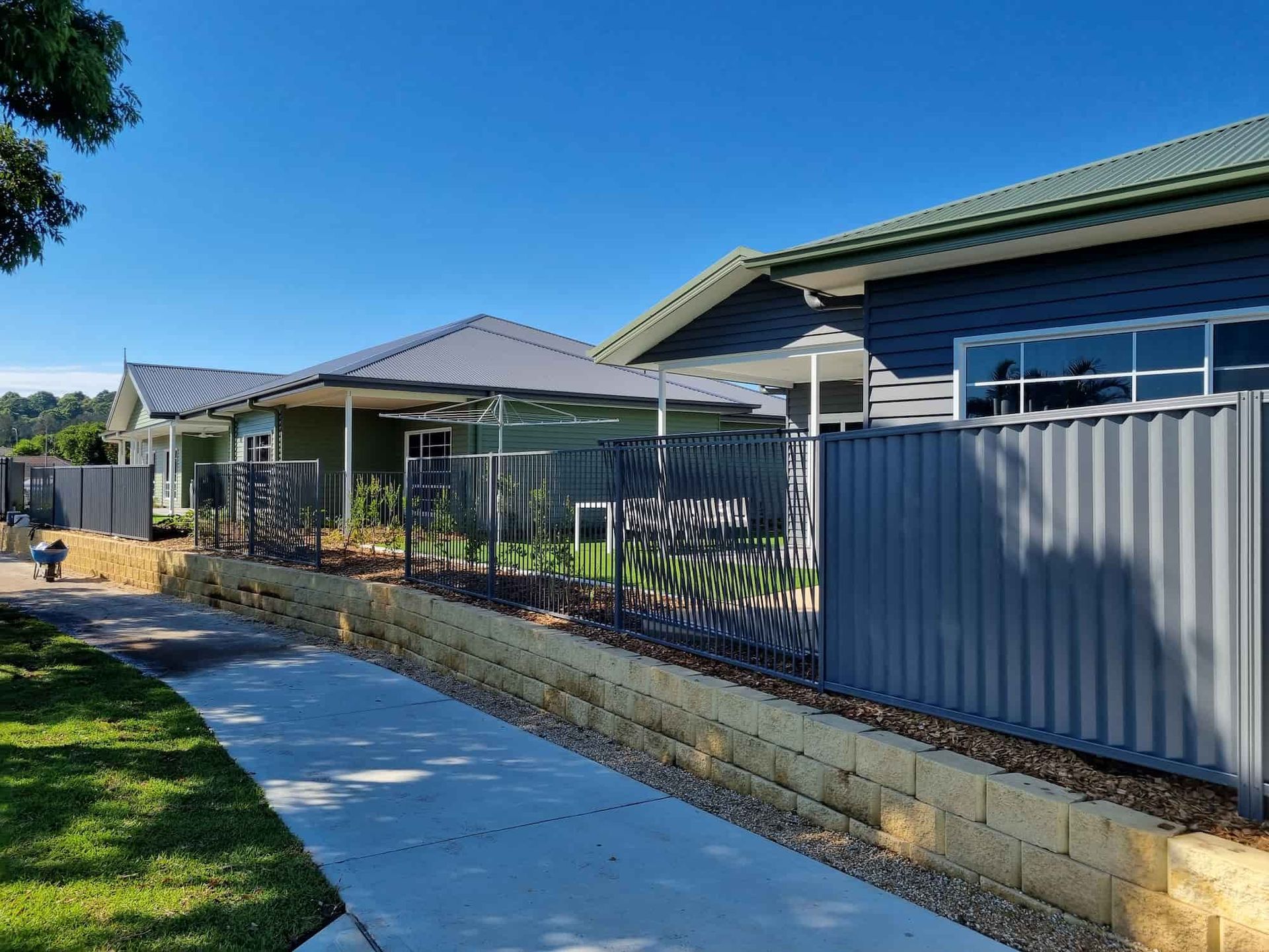 A Sliding Gate With A Motor Attached To It — Australian Advanced Fencing In Lake Cathie, NSW