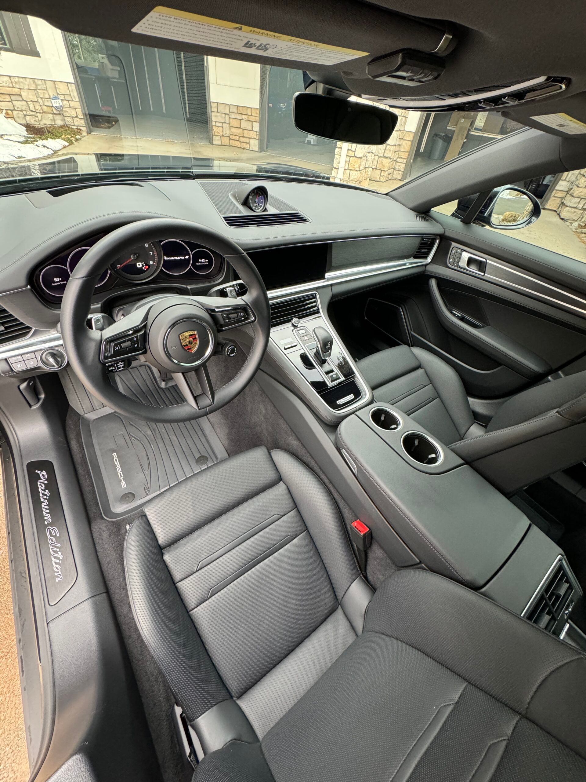 The interior of a porsche panamera turbo s is shown.
