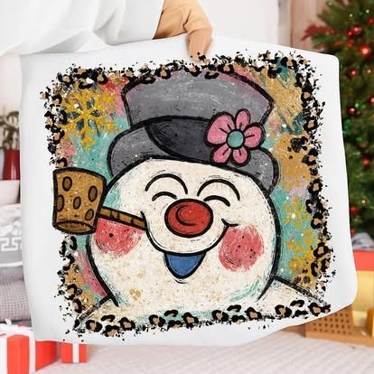 Smiling snowman with red nose, blue tongue, and flower hat, holding a pipe, in leopard print frame.