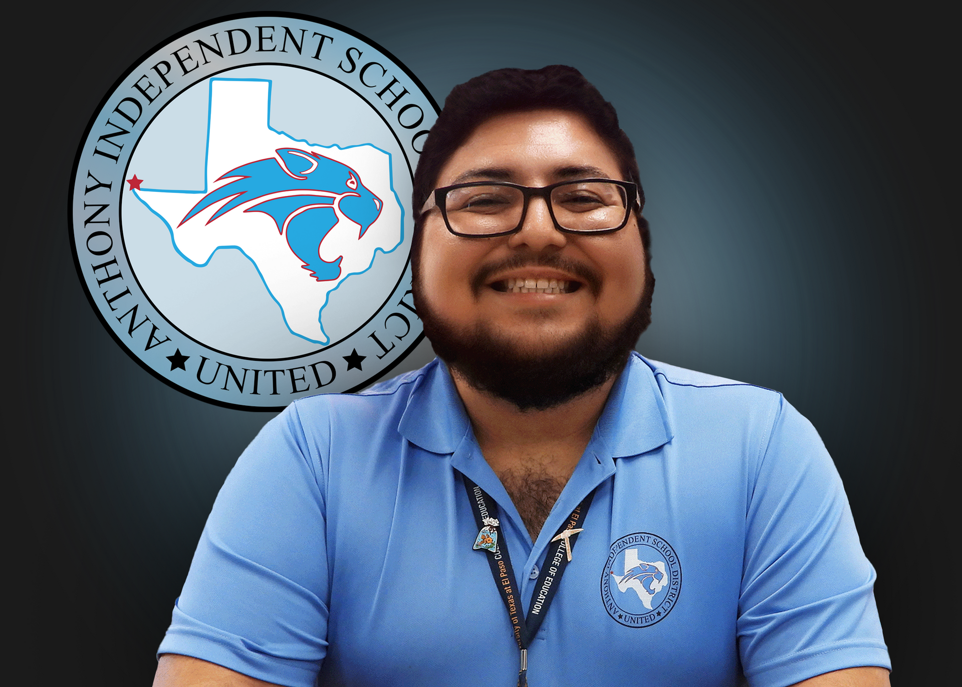 A man wearing glasses and a blue shirt is smiling in front of an independent school logo.