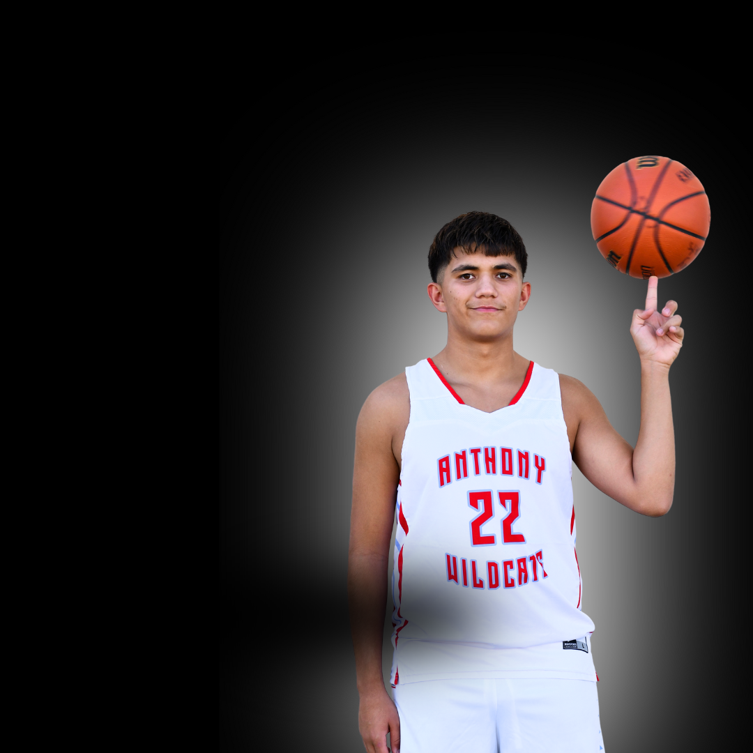 Basketball player balances basketball on index finger