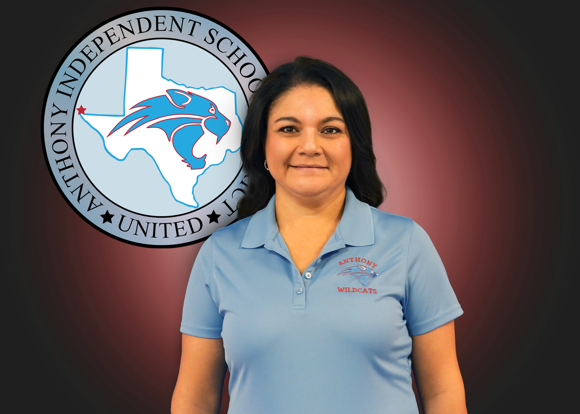 A woman is standing in front of an independent school logo