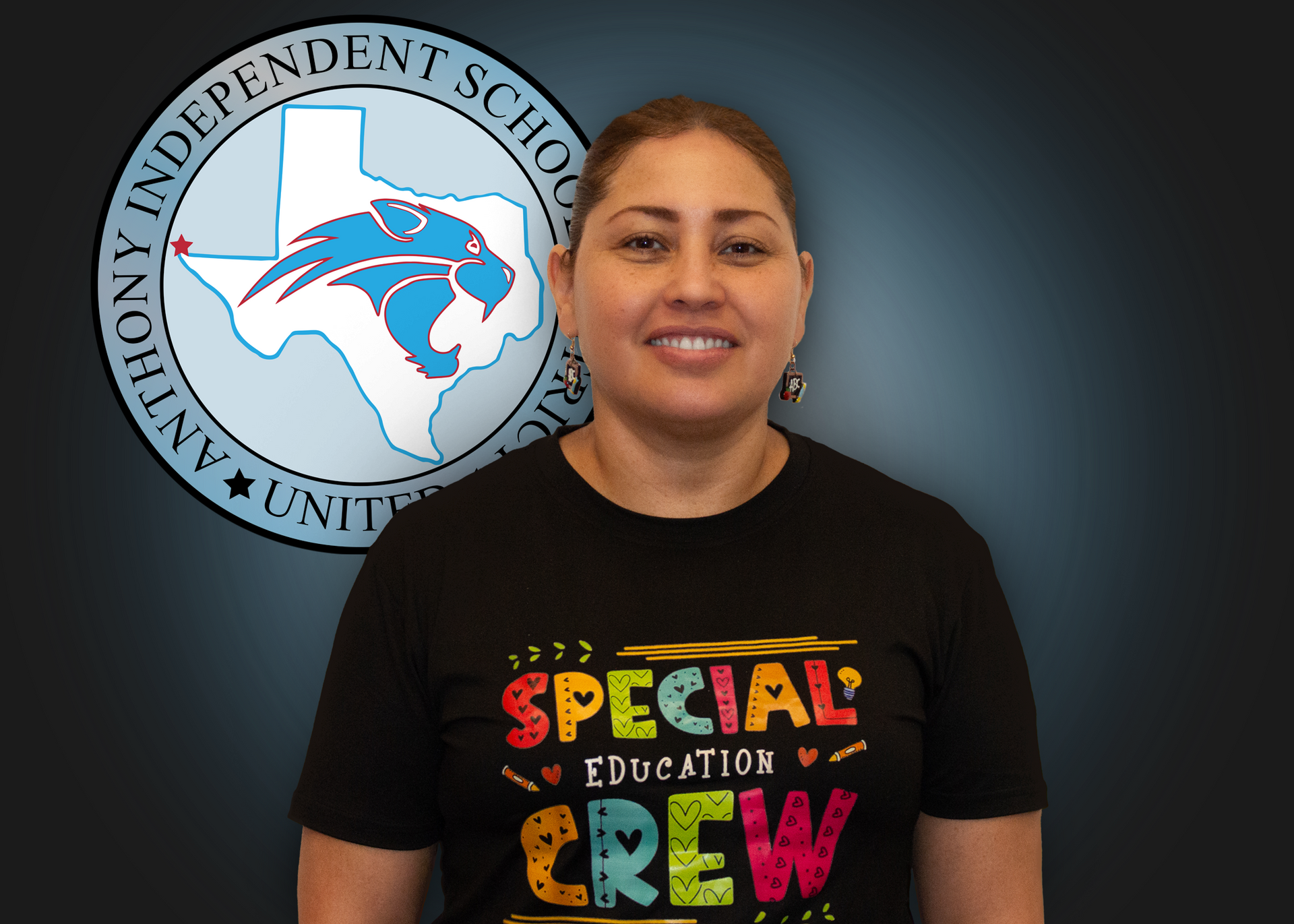 A woman wearing a black shirt that says special education crew
