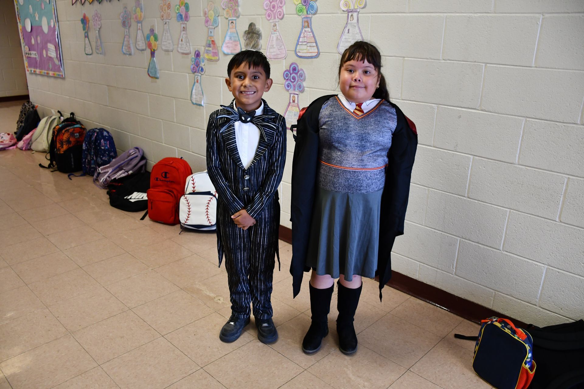 Elementary students dressed like their favorite movie characters from Harry Potter and Nightmmare Before Christmas