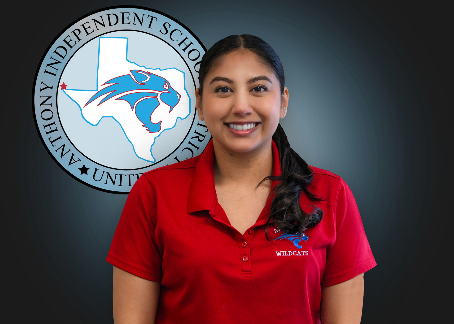 A woman in a red shirt is smiling in front of an independent school logo.