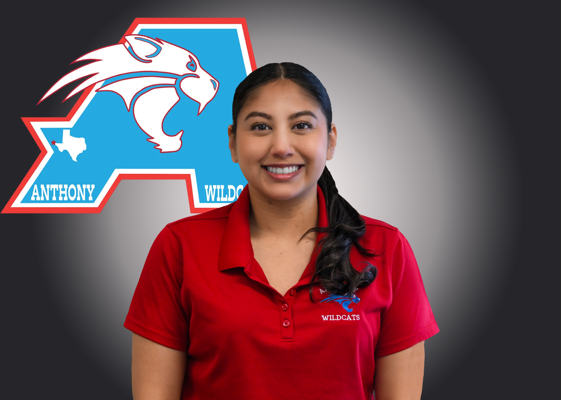 Woman stands in front of Anthony Athletics logo