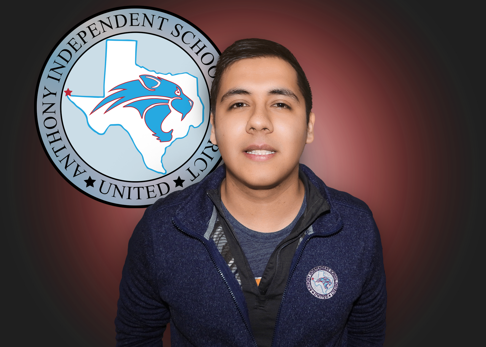 A man stands in front of an independent school logo