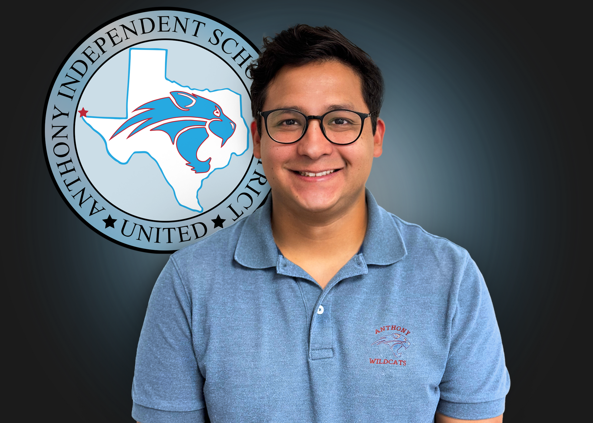 A man wearing glasses is smiling in front of an independent school logo