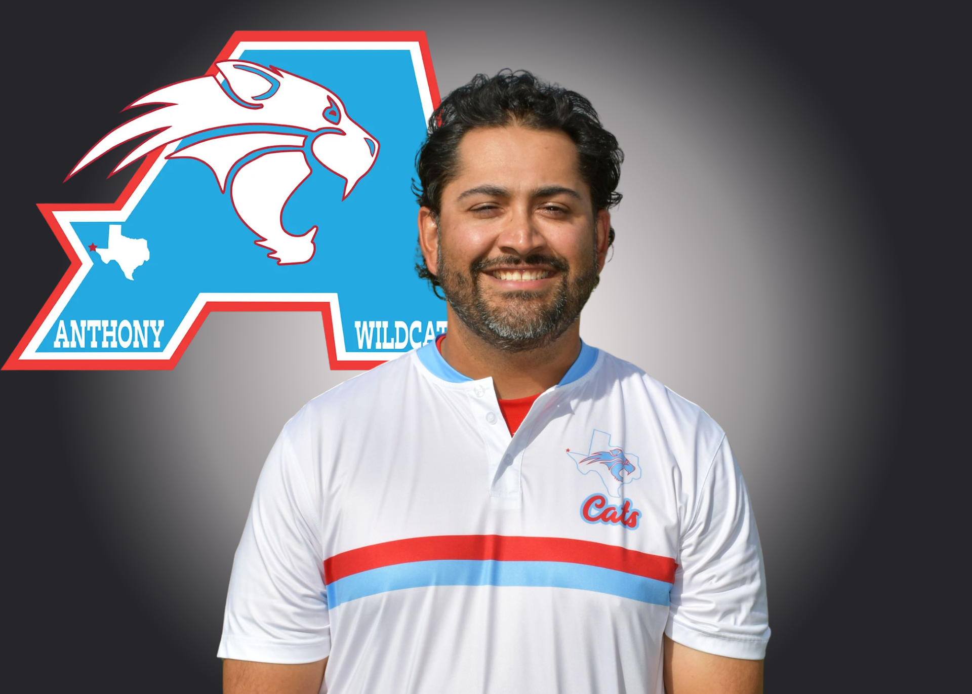 Man stands in front of Anthony Athletics logo