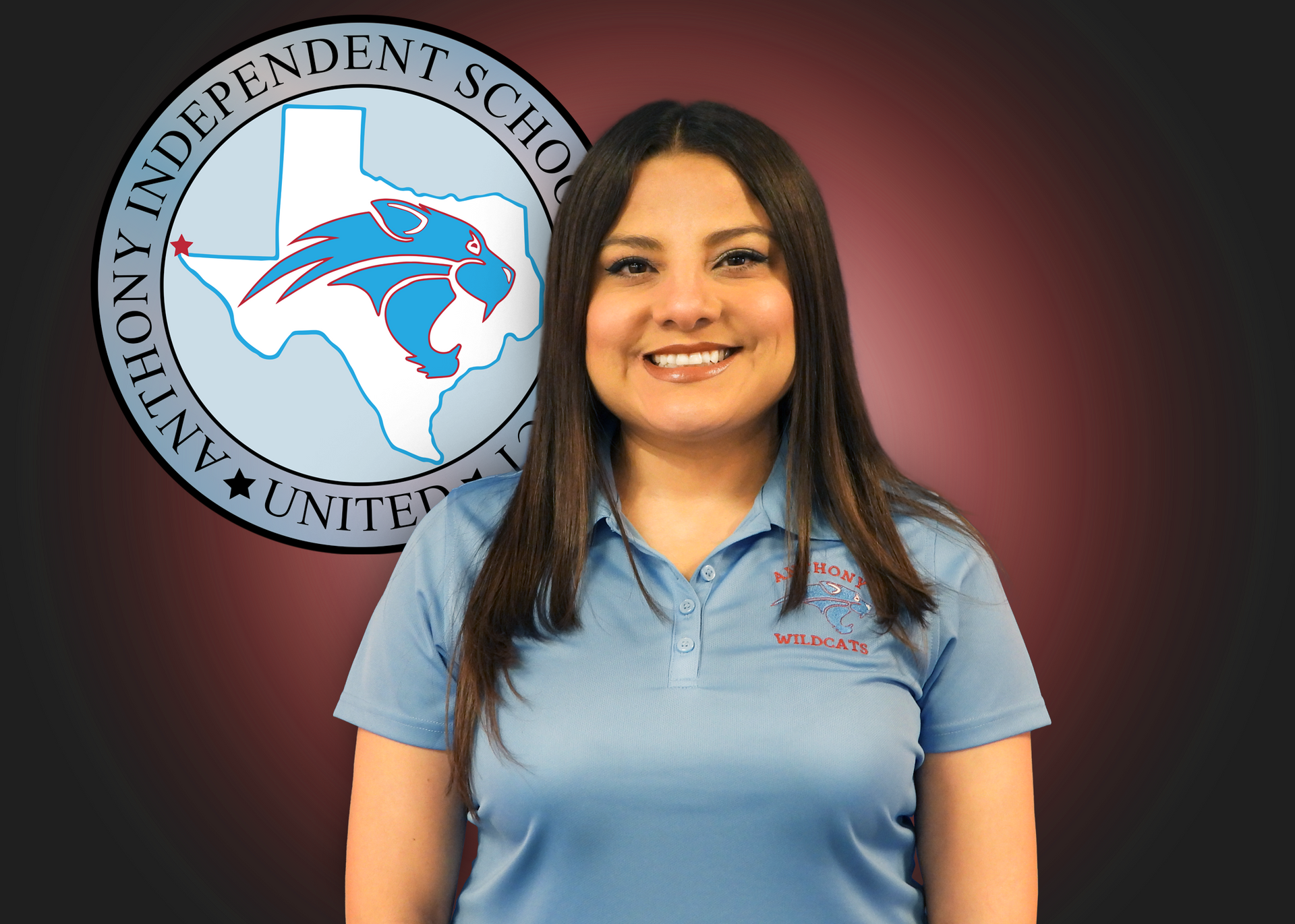 A woman in a blue shirt is standing in front of an independent school logo.