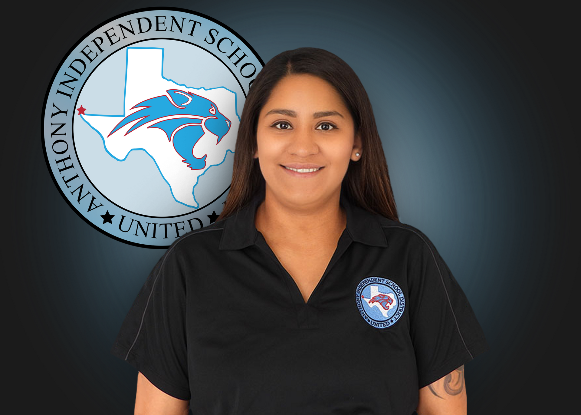 A woman in a black shirt is standing in front of an anthony independent school logo.