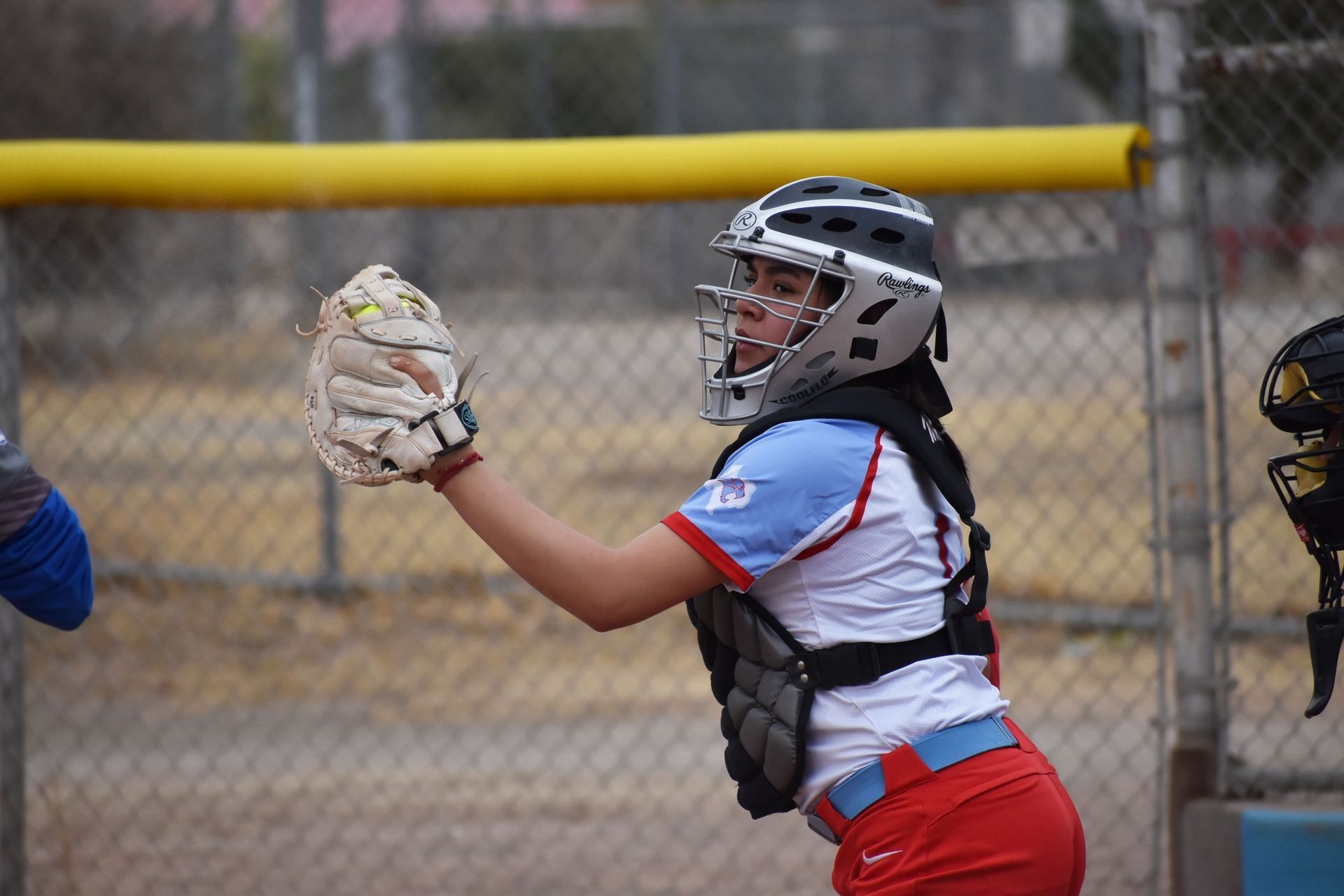 Anthony softball player catching ball with glove