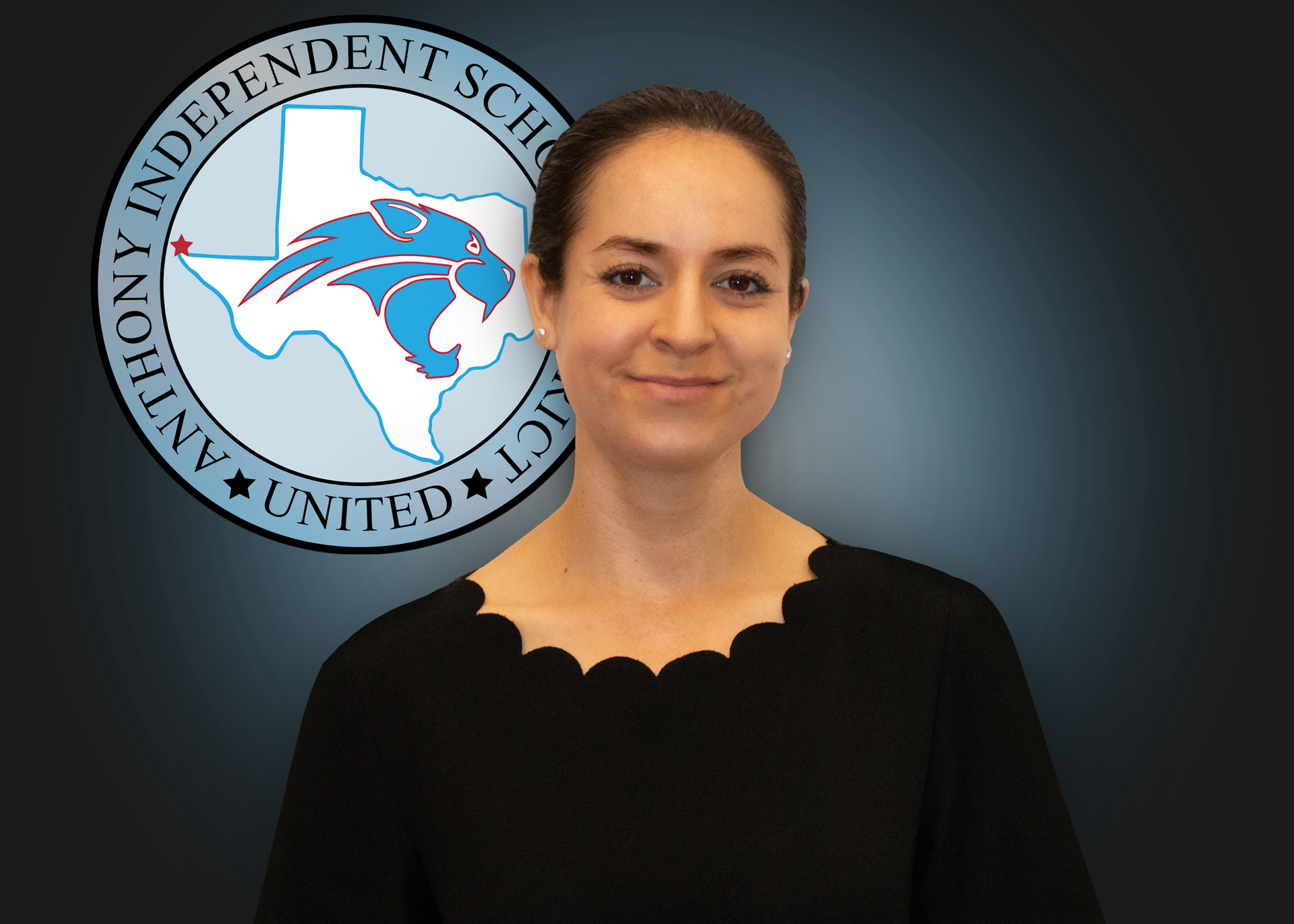 A woman stands in front of an anthony independent school logo