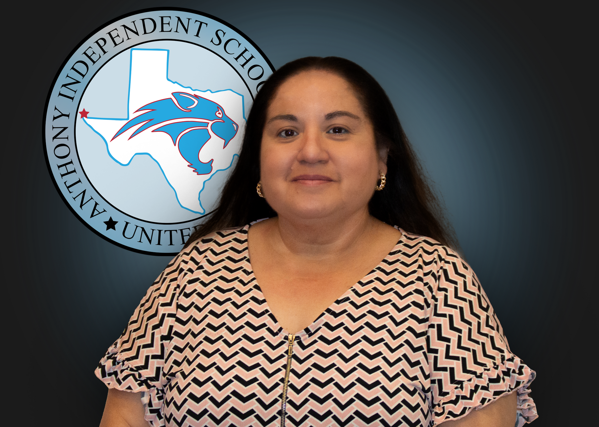 A woman is standing in front of an independent school logo.