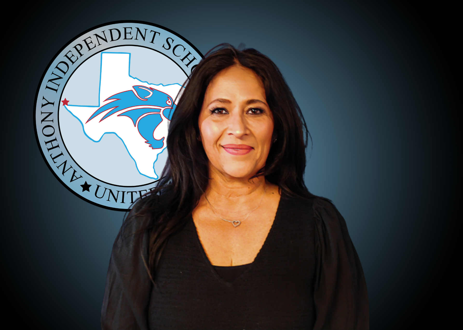 Woman wearing black shirt stands in front of Anthony Independent School District logo