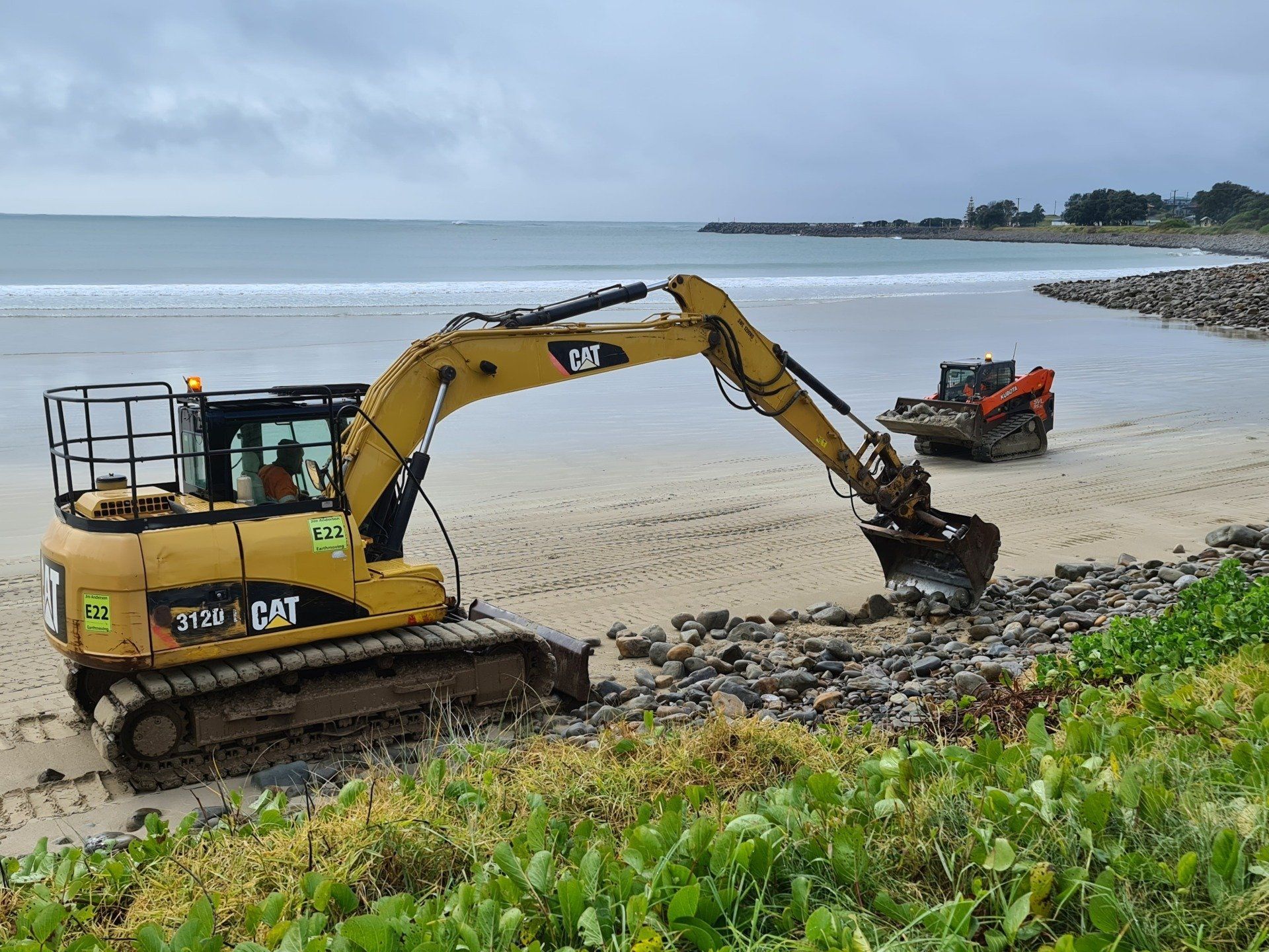 Excavator on the beach — About in Coopernook, NSW