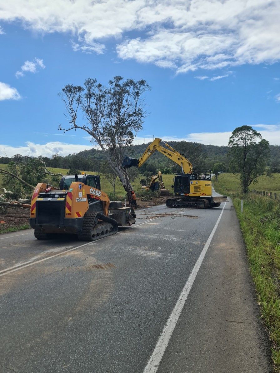 Yellow Excavator At A Construction Site — Earthmoving & Excavation in Gloucester, NSW