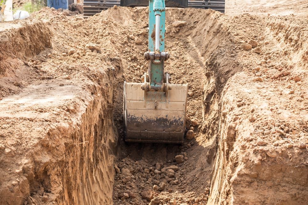Digging a Trench — Earthmoving & Excavation in Wingham, NSW