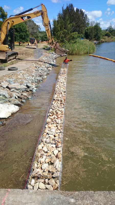 Excavator at Water Diversion — Projects in Coopernook, NSW