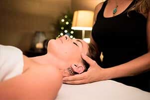 Woman having a relaxing head massage - Massage Therapy in Stockton, CA