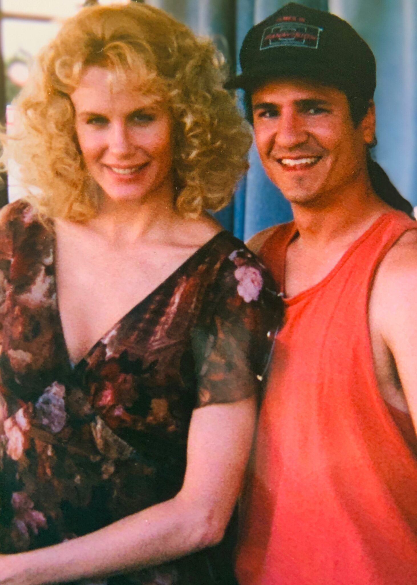 A man and a woman are posing for a picture together