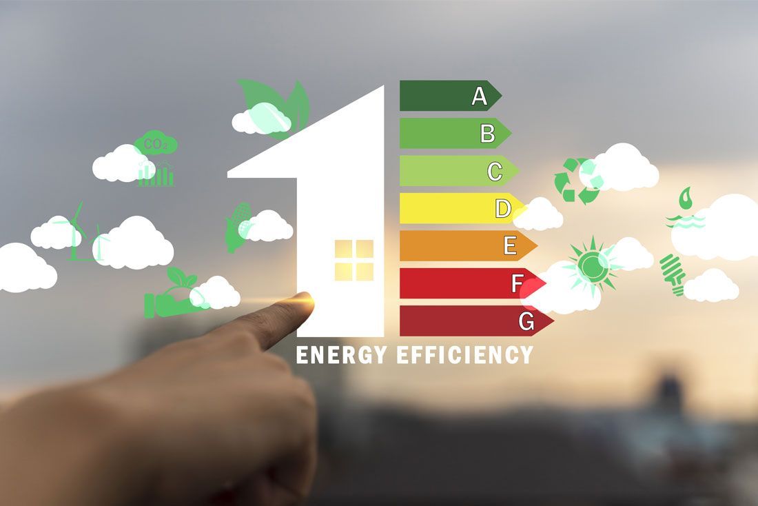 a person 's finger is pointing at an energy efficiency chart