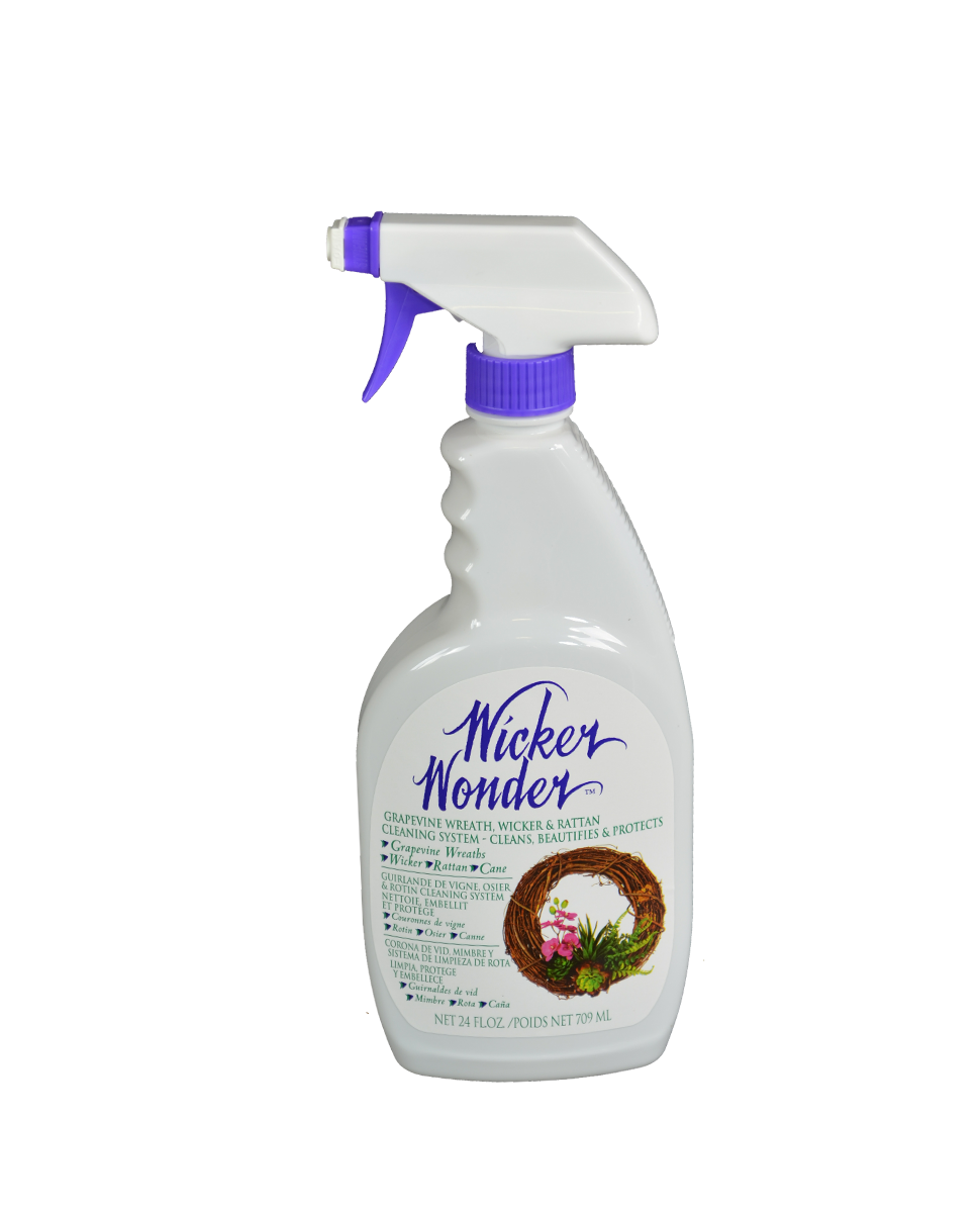 A bottle of Wicker wonder cleaner with a purple sprayer on a white background.