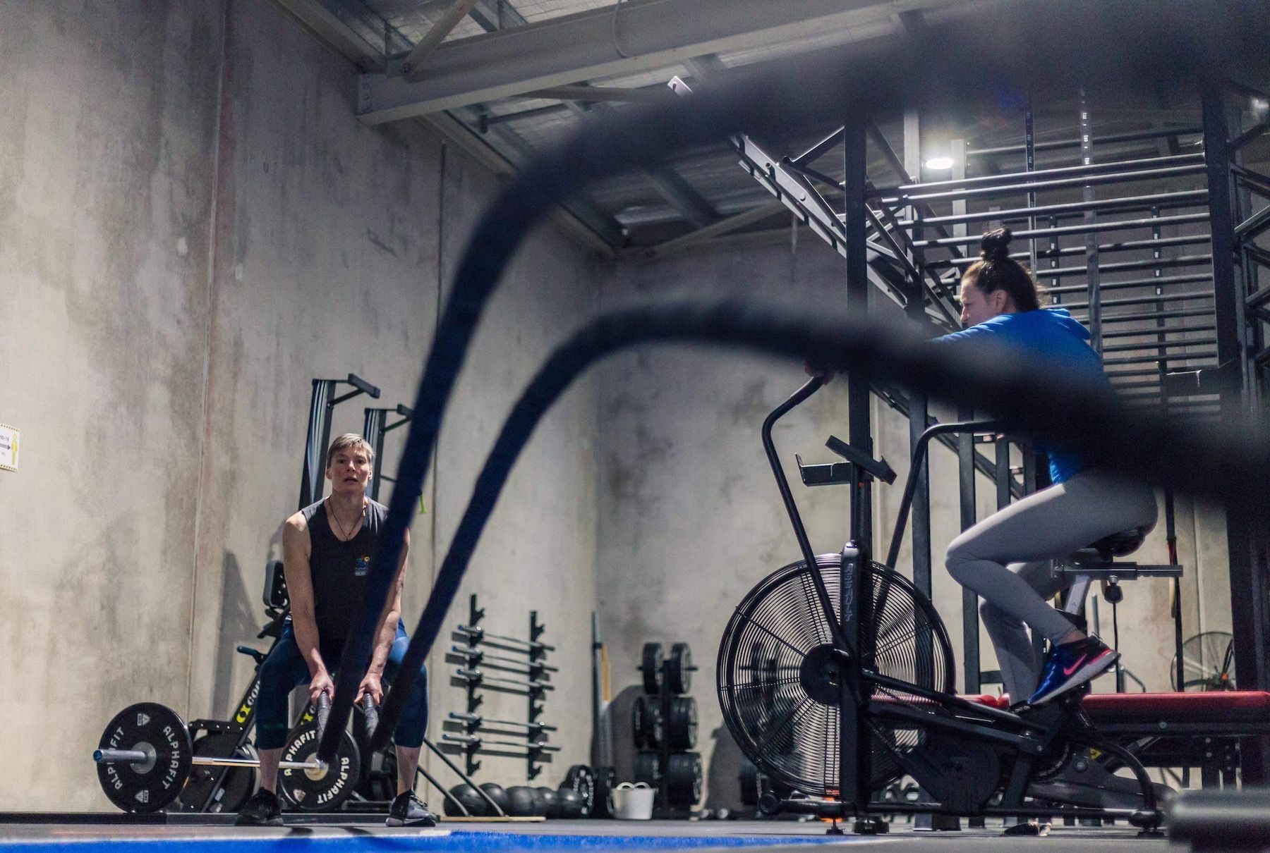 Man And Woman Stretching At The Gym — Fitness Studio & Gym in Sebastopol