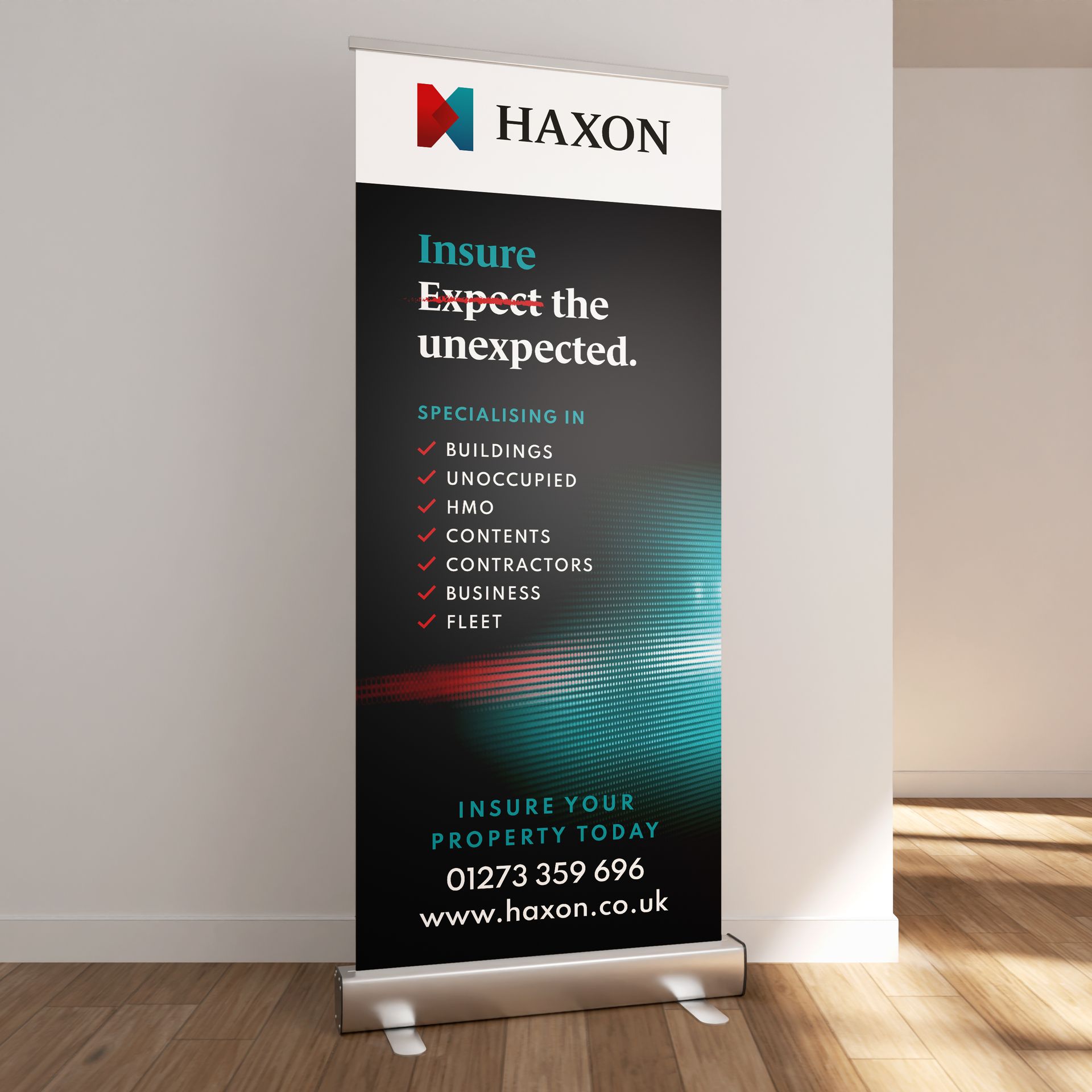 A haxon banner is displayed on a wooden floor