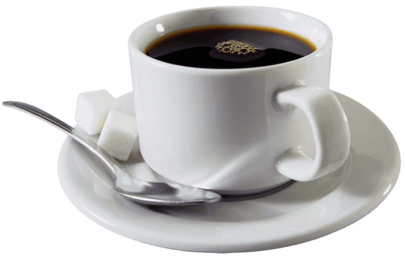 A cup of coffee on a saucer with sugar cubes and a spoon